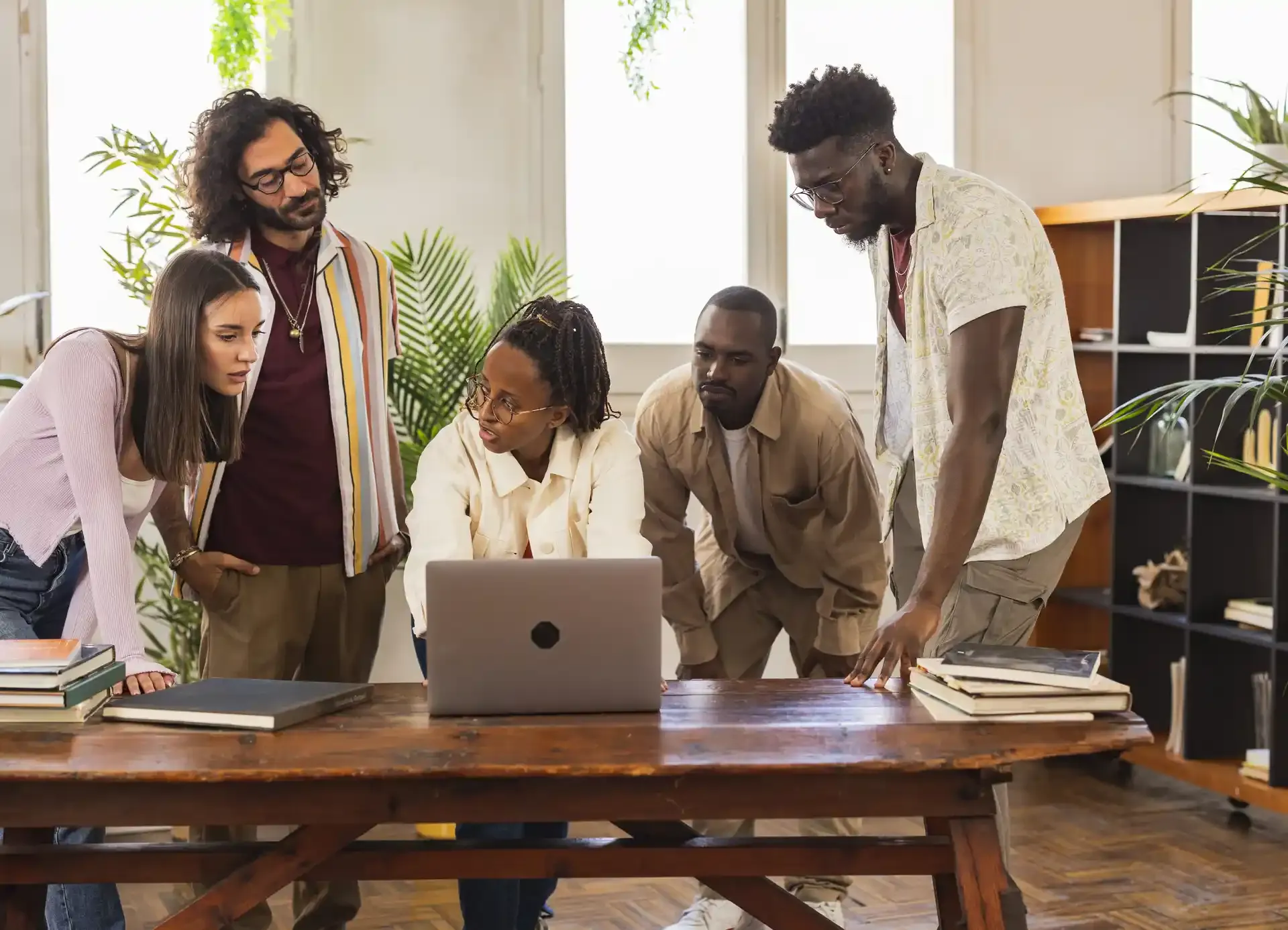 Professional team collaborating in a modern office setting